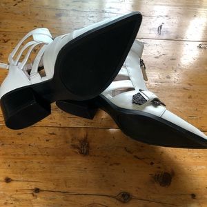 nine west carrillo cutout buckle booties